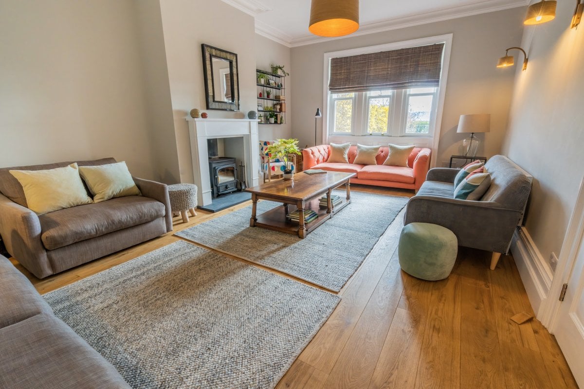 Large spacious lounge with woodburner